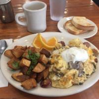 Ballard Industrial Scramble Breakfast · Choice of meat with onion, mushroom, cheddar cheese and sour cream. Served with home fries a...
