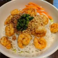Vermicelli Noodles · Served on a bed of mix lettuce top with your choice of protein, along with crushed peanuts, ...