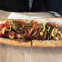 New York Dog · 1/4 lb. all-beef hot dog, grilled onions, tomatoes and jalapenos with crushed bacon.