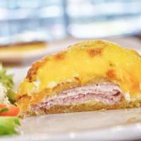 Ham Cheese Croissant · Served with salad. Ham, cheddar cheese and bechamel.