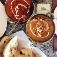 Butter Chicken · Boneless chicken cooked in tandoor and finished in butter with
aromatic Indian spices and cr...