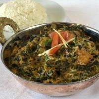 Lasooni Saag Paneer · Spinach, garlic and cottage cheese.