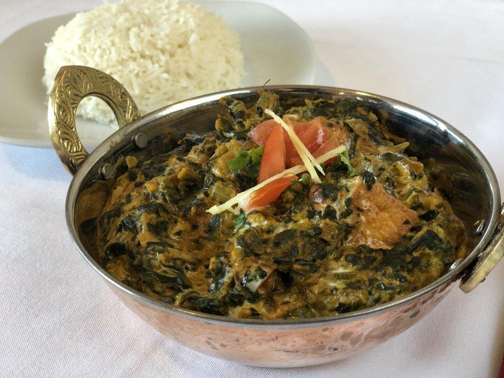 Lasooni Saag Paneer · Spinach, garlic and cottage cheese.