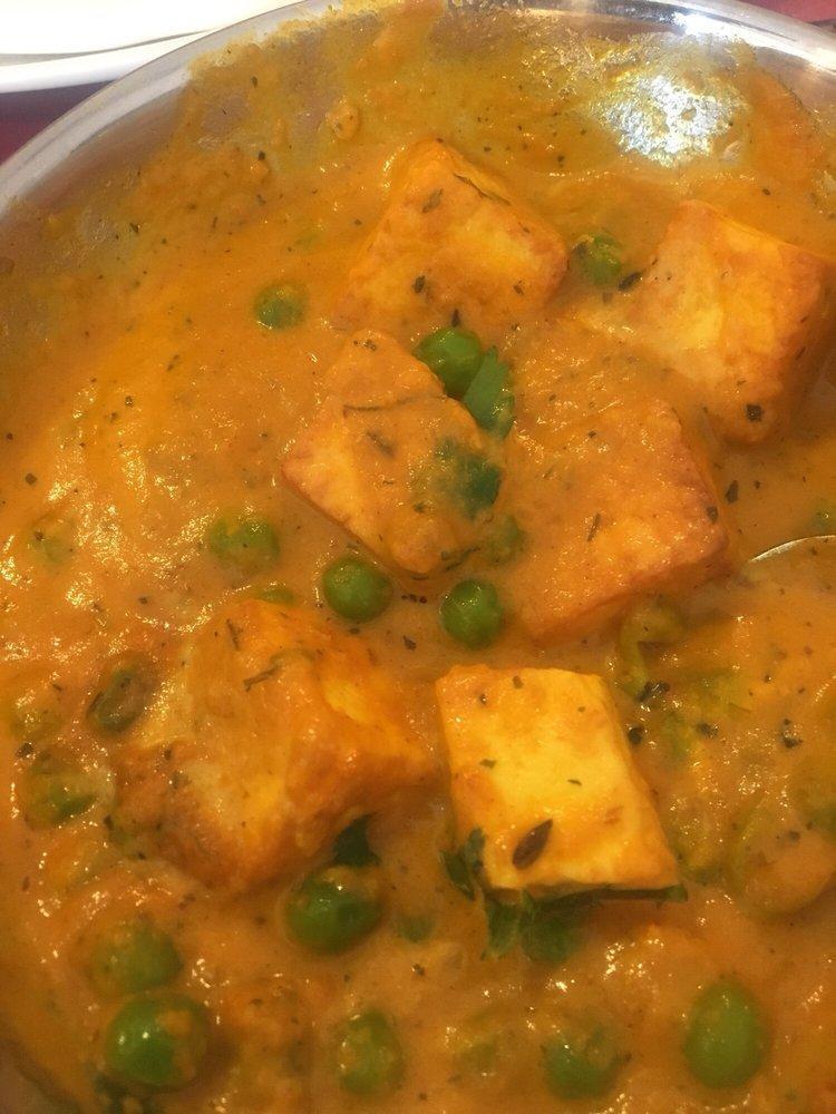 Mutter Paneer · Indian cottage cheese and green peas cooked in tomato tangy sauce and exotic Indian spice.