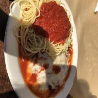 Chicken Parmigiana · A boneless breast of chicken simmered in a zesty tomato sauce and topped with mozzarella che...