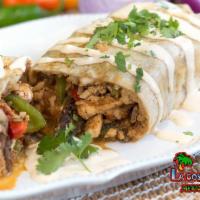 Eric's Famous Surf & Turf Burrito · Marinated grilled chicken, marinated steak and tangy shrimp smothered over a layer of rice, ...