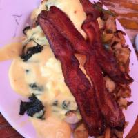 Eggs Florentine · 2 poached eggs over crisp bacon, steamed spinach, sliced tomato on a toasted English muffin ...
