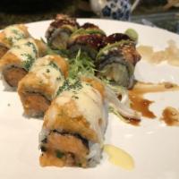 Dragon Roll · Sushi roll with ell, shrimp tempura, and avocado.