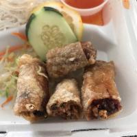 Vietnamese Egg Roll · Fried pork and vegetables wrapped with rice paper. Served with chili-lime sauce.