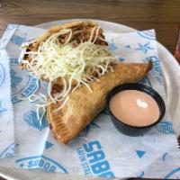 Empanada · Fried pastry filled with cheese and your choice of ground beef, shredded chicken, chorizo or...