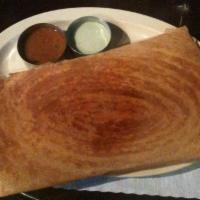 Jaipur Paneer Dosai · Thin rice crepe with home made cheese, peas, tomato, onion and spices. Served with sambar an...