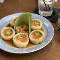 Cherry Blossom Roll · Fresh salmon, tuna, yellowtail, avocado, spicy sprouts and jalapeno rolled in a thin cucumbe...