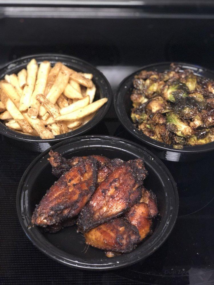 Dcity Pit Smoked Wings · Served with a side of cilantro ranch.