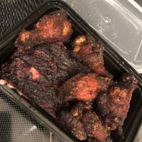 Ribs and Wings Combo · 1/2 lb. spare ribs and 1/2 dozen smoked wings, 1 small side. 