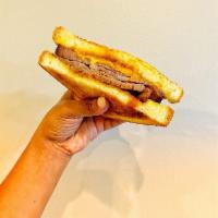 Smokehouse Melt Sandwich · Brisket, cheddar-Jack cheese and house BBQ sauce.