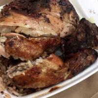 Jerk Chicken Lunch Special · Served with rice & one side order.