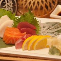 Sashimi · 7 pieces of assorted sashimi.