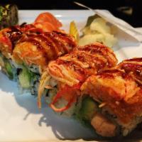 Incredible Roll · Salmon tempura and avocado topped with spicy crabmeat, eel sauce, and spicy mayo.