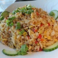 House Fried Rice Chicken · Fried rice, eggs, red bell pepper, onions and Bonchon soy garlic sauce.