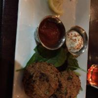 Chickpea Bay Cakes · House made veggie bay cakes, fried and served with vegan remoulade, cocktail sauce, and lemo...