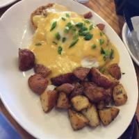 Crab Benedict · Crab and andouille sausage provide a delicious twist to this classic dish. Served on top of ...