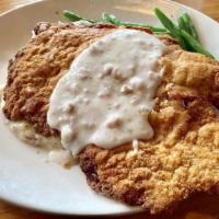 Country Fried Steak Lunch Special · You won’t leave hungry after eating this house-made pork tenderloin topped with sausage grav...