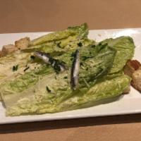 Caesar Salad · romaine leaves, anchovies, Parmigiano Reggiano, garlic croutons