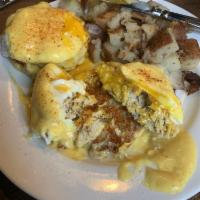 Crab Cake Benedict · 2 poached eggs, 2 Maryland style crab cakes and cajun hollandaise sauce.