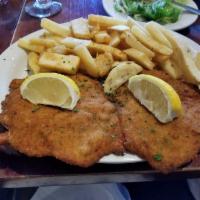 Milanesa · This traditional Argentine entree features the finest cut of tender beef-steak, sauteed with...