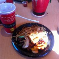Chow Mein · Tender noodles with onions, cabbage, celery, carrots, and bean sprouts in a sweet black sauce.