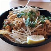 Pad Thai · Gluten free. Rice noodles in our tangy Pad Thai sauce with green onions, carrots, egg, peanu...