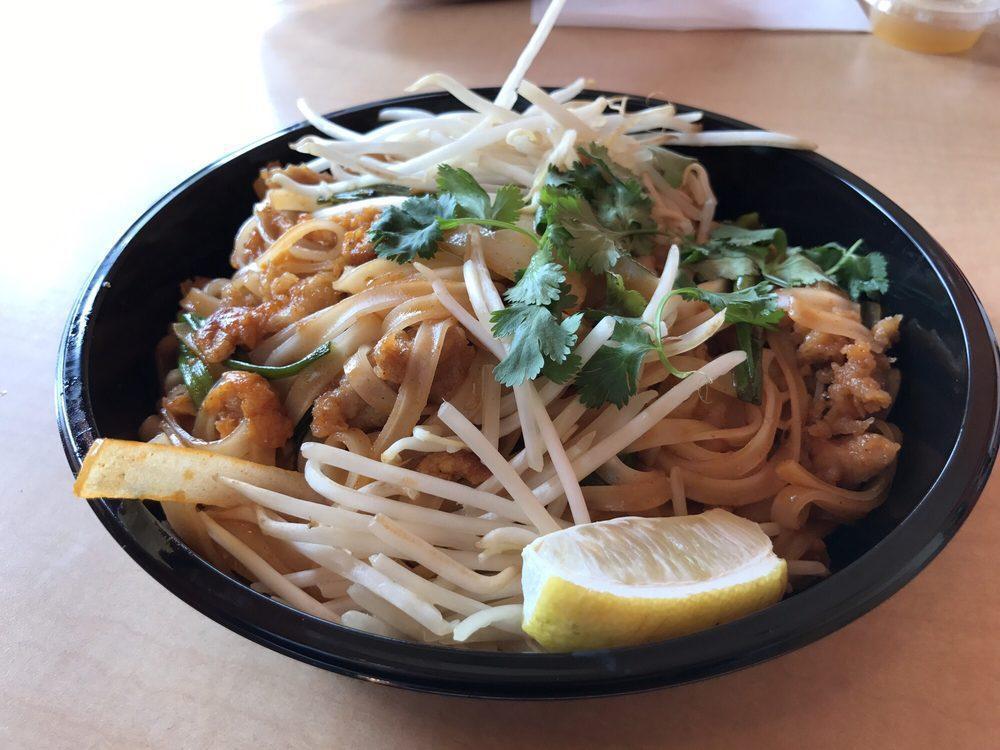 Pad Thai · Gluten free. Rice noodles in our tangy Pad Thai sauce with green onions, carrots, egg, peanuts and bean sprouts.