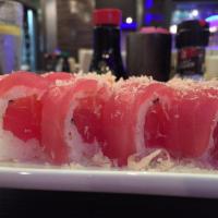 Tiger Roll · Fresh salmon and tuna inside. Topped with fresh salmon, tuna, freshwater eel, tempura crunch...