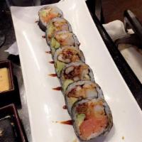 Ocean Roll · Soft shell crab, shrimp tempura, smoke salmon and avocado inside, topped with eel sauce.