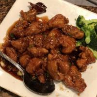 Orange Chicken · Fried dark meat chicken tossed with fresh orange peel and sauteed in a sweet and spicy sauce...