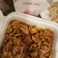 Teriyaki Chicken · White meat chicken sauteed with teriyaki sauce, topped with sesame seed and served with whit...