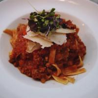 Bolognese · Wild boaride bacon, milk fed veal, Angus beef, chefs choice pasta.