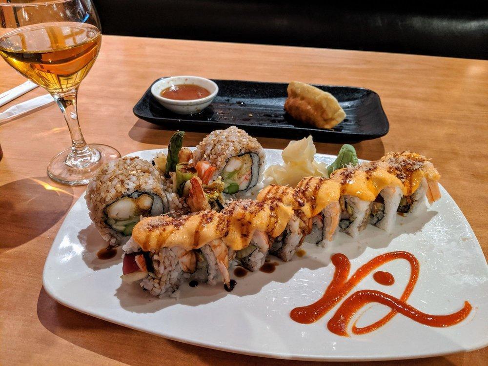 Dr. Greg's Roll · Tuna, crab, cucumber and avocado topped with shrimp and chef's specialty baked sauce.
