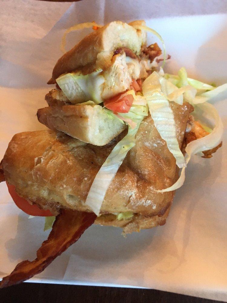Chicken Melt · Grilled chicken breast, bacon, provolone cheese, honey mustard, lettuce, tomato.