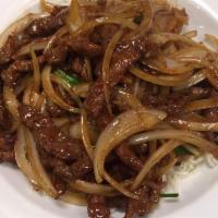Mongolian Beef · Wok-fried sliced beef with onion and scallion in our special sauce.