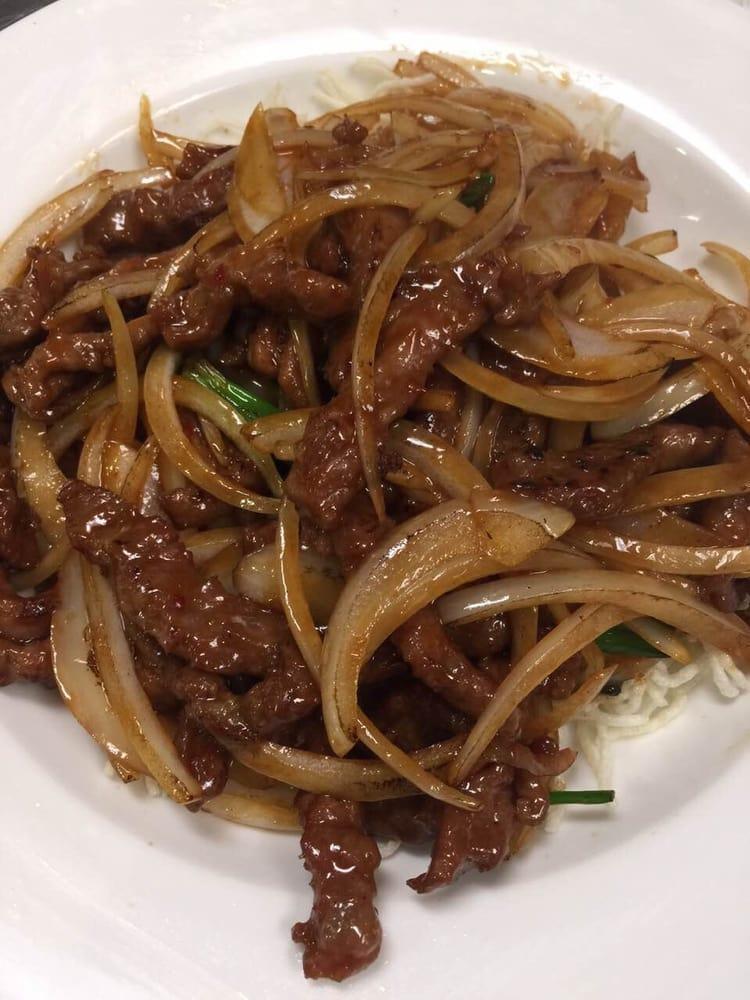 Mongolian Beef · Wok-fried sliced beef with onion and scallion in our special sauce.