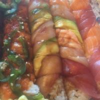Rainbow Roll · Raw. Krab, salmon, white fish, yellowtail, shrimp (ebi) tuna, avocado, cucumber, sweet sauce.