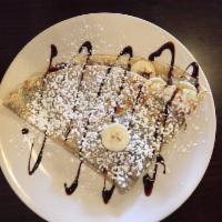 Almond Joy Crepe · Toasted coconut and almonds, bananas, spiced cookie mix and chocolate drizzle.