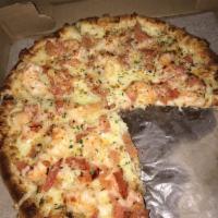 Shrimp Scampi Pizza · Garlic butter sauce, fresh shrimp, grated Romano cheese. Tomatoes are optional.