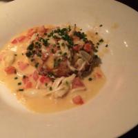 Crab Cake · Finished with jumbo lump crab, chive beurre blanc