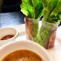 Spring Rolls · Imitation meat, lettuce, vermicelli, fresh herbs rolled in rice paper served with peanut sau...