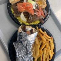 Gyro Wrap · tomato, onion, tzatziki sauce. Served with side of fries and pickled veggies