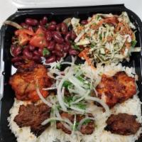 Kebab Combo Plate · rice, salad, hummus, pita bread, garlic sauce