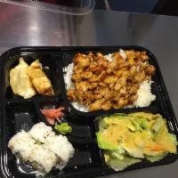Chicken Teriyaki Bento Box · served with 2pc dumpling and 4pc california roll and  salad. please choose fried rice OR ste...