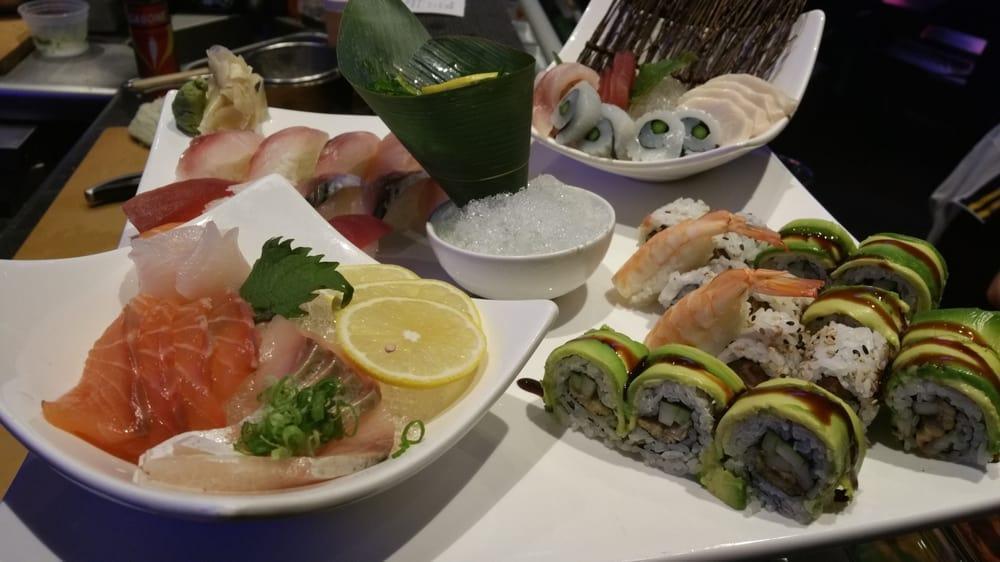 Yoshimoto Combo · 5 pieces of assorted sushi, 15 slices sashimi, and spicy tuna roll.